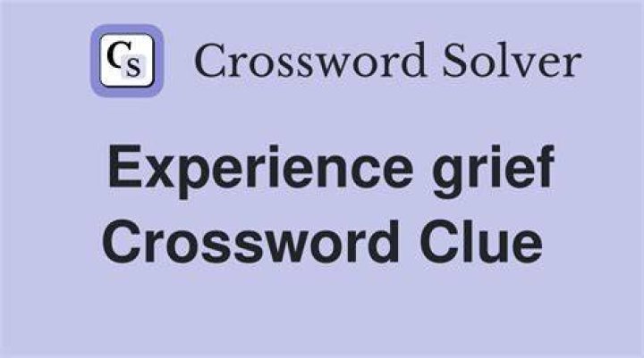 Experiencing the first stage of grief, say Crossword Clue
