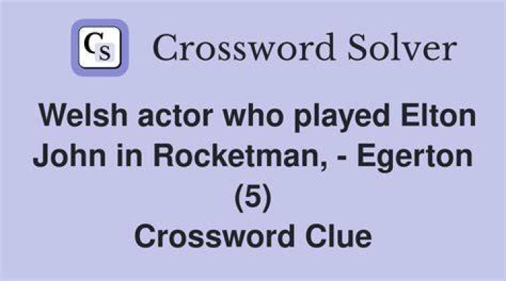 John depicted in the biopic “Rocketman” Crossword Clue